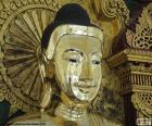 Изображение головы Будды золото в Мьянме